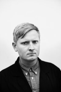 Portrett Erlend O. Nødtvedt av fotograf Elias Dahlen.